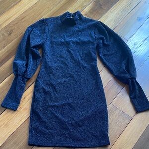 HYFVE Shimmering Black dress. Turtle neck with button detail behind neck.